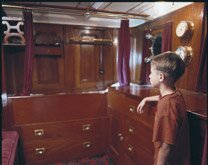 Boy inside the Captain's Cabin